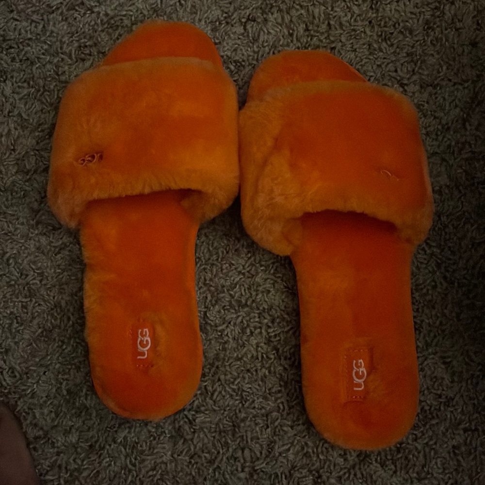 Orange Ugg slides….